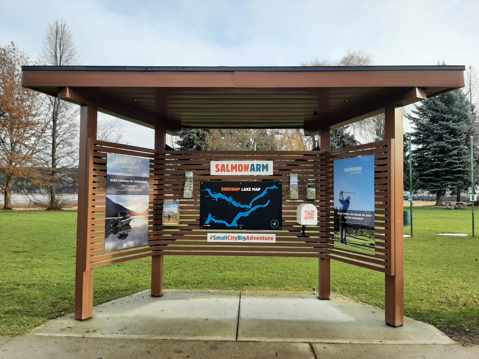 The covered outdoor information kiosk with the Salmon Arm lake map at Marine Peace Park